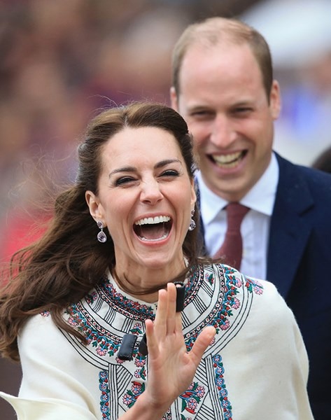 THIMPHU, BHUTAN - APRIL 14: Prince William, Duke of Cambridge looks on as Catherine, Duchess of Cambridge fires an arrow during an Bhutanese archery demonstration on the first day of a two day visit to Bhutan on the 14th April 2016 in Paro, Bhutan. The Royal couple are visiting Bhutan as part of a week long visit to India and Bhutan that has taken in cities such as Mumbai, Delhi, Kaziranga, Bhutan and Agra. (Photo by Chris Jackson/Getty Images)